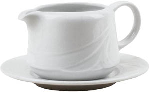 Fat cream is an example of high cholesterol foods: Picture of white cream pitcher.
